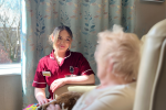 team leader care home taking care of a resident